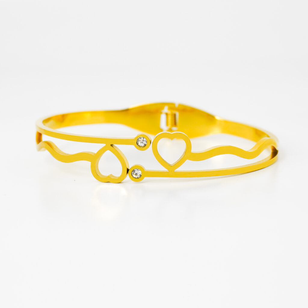 Elegant Gold-Tone Double Heart Bracelet with Minimal Crystal Accents